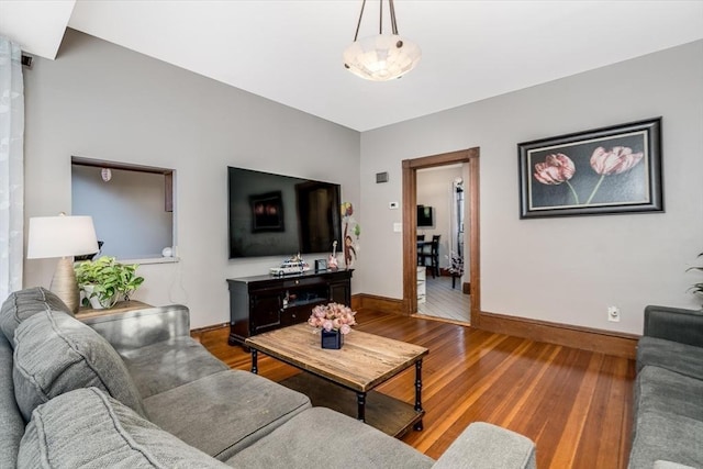 living room with wood-type flooring