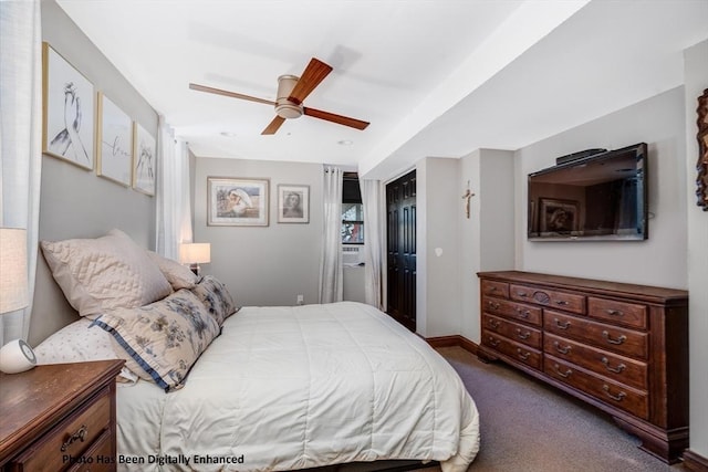 bedroom with ceiling fan and carpet floors