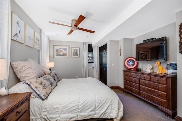 bedroom featuring carpet flooring, ceiling fan, and a closet