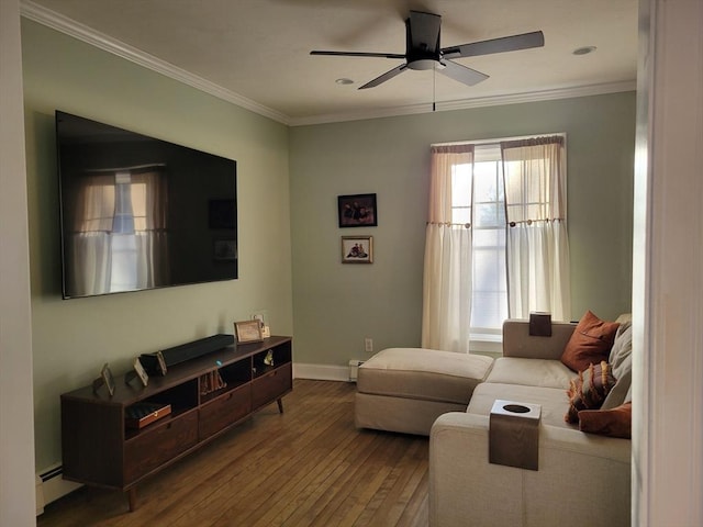 living room featuring crown molding, hardwood / wood-style flooring, a baseboard heating unit, and ceiling fan