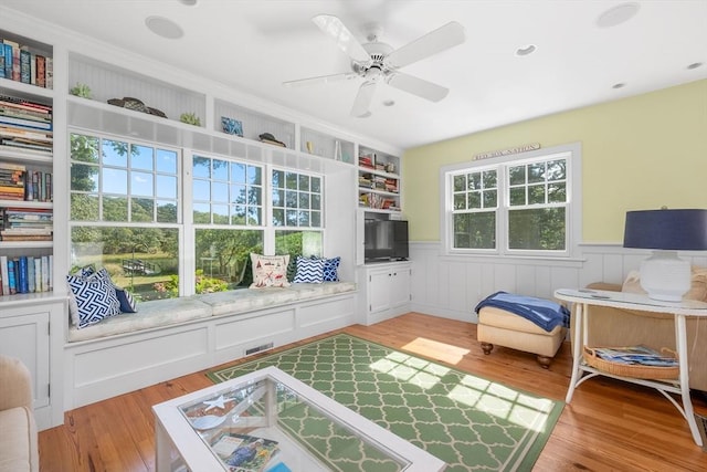 21 N Rd, Harwich, MA 02671 - rec room featuring wainscoting, ceiling fan, and light wood-type flooring