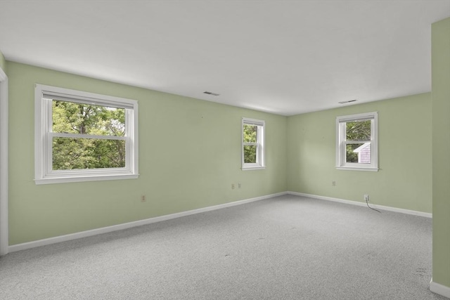 18 Harbor Hill Dr Unit 18, Bourne, MA 02532 - carpeted empty room featuring baseboards