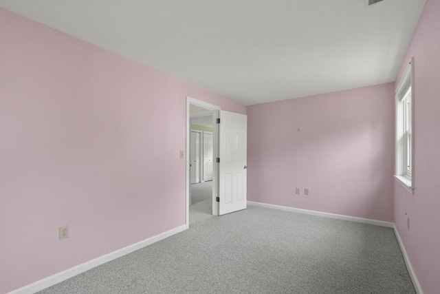 18 Harbor Hill Dr Unit 18, Bourne, MA 02532 - empty room with carpet flooring and baseboards