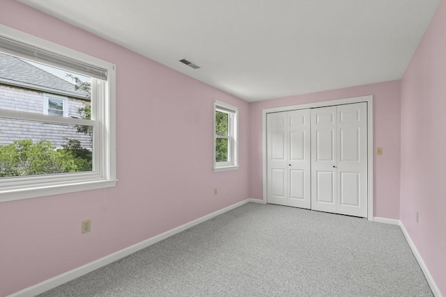 18 Harbor Hill Dr Unit 18, Bourne, MA 02532 - unfurnished bedroom featuring carpet and a closet