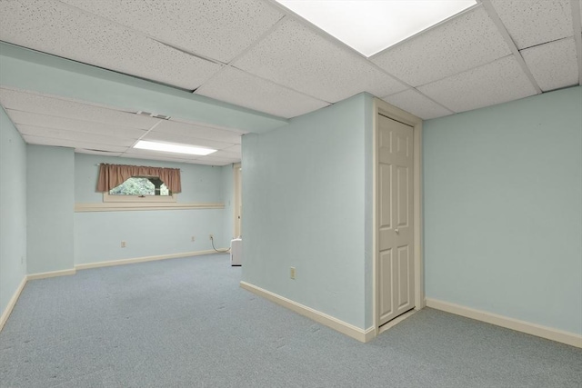 18 Harbor Hill Dr Unit 18, Bourne, MA 02532 - finished below grade area with a paneled ceiling and carpet floors