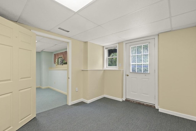 18 Harbor Hill Dr Unit 18, Bourne, MA 02532 - spare room with a paneled ceiling, dark colored carpet, and healthy amount of natural light