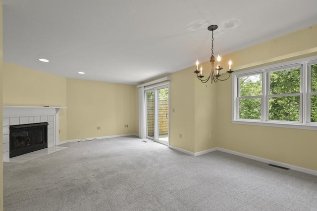 18 Harbor Hill Dr Unit 18, Bourne, MA 02532 - unfurnished living room featuring carpet floors, a fireplace, a chandelier, and recessed lighting