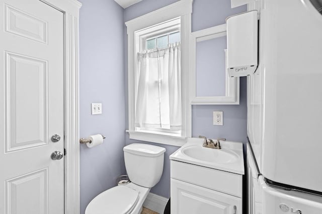 26 N Munroe Ter Unit 1, Boston, MA 02122 - bathroom with vanity, toilet, and water heater