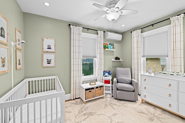 26 N Munroe Ter Unit 1, Boston, MA 02122 - carpeted bedroom with a wall unit AC, a crib, recessed lighting, a ceiling fan, and baseboards
