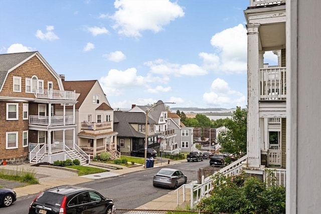 26 N Munroe Ter Unit 1, Boston, MA 02122 - view of asphalt street with a residential view, sidewalks, and street lighting