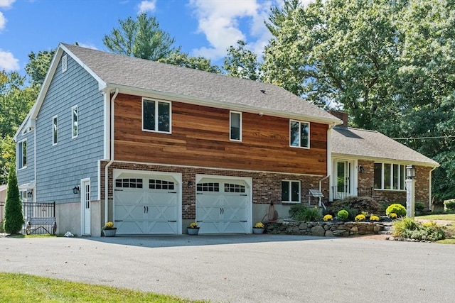 tri-level home featuring a garage