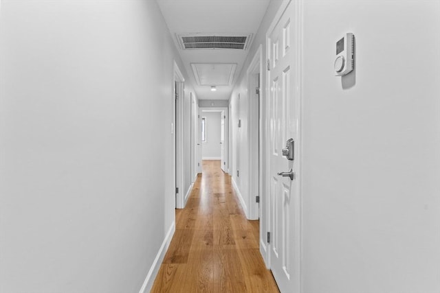 hallway featuring light wood-type flooring