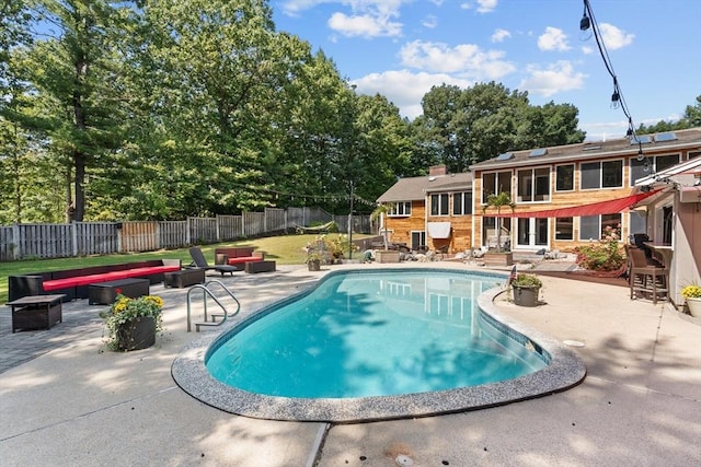 view of pool with a patio and an outdoor hangout area