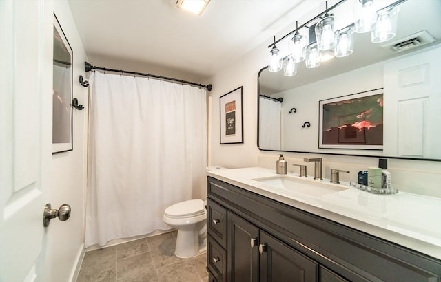 bathroom featuring visible vents, curtained shower, vanity, and toilet