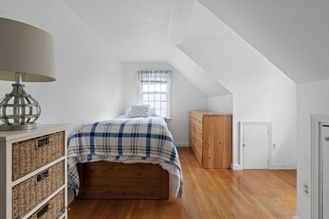 62 Teakettle Ln, Duxbury, MA 02332 - bedroom with lofted ceiling and light wood-style floors
