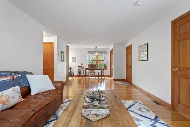 62 Teakettle Ln, Duxbury, MA 02332 - living area with light wood-style floors and baseboards