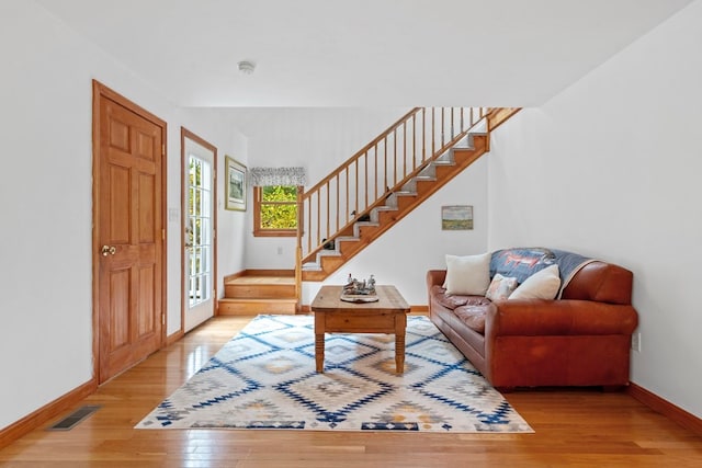 foyer with light hardwood / wood-style floors