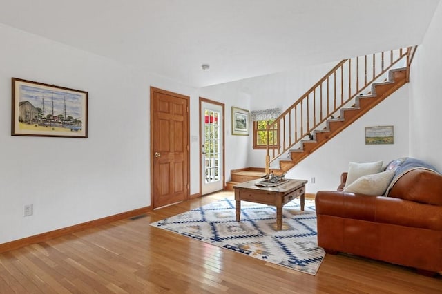 62 Teakettle Ln, Duxbury, MA 02332 - living area featuring stairway and wood finished floors