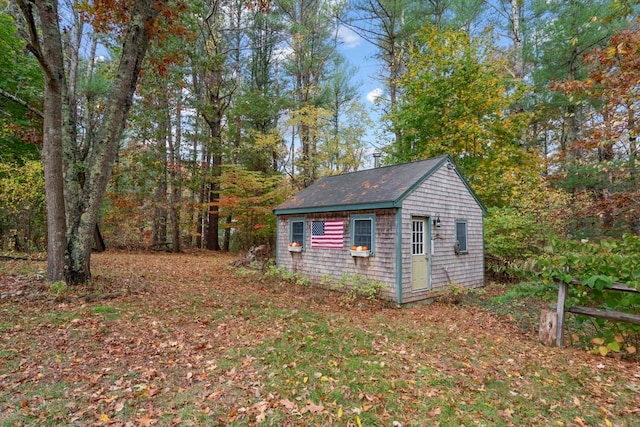 exterior space with a shed