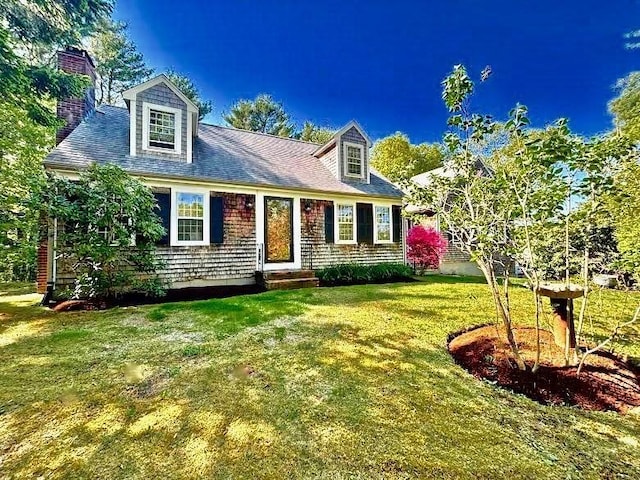 62 Teakettle Ln, Duxbury, MA 02332 - new england style home with a front lawn and a chimney