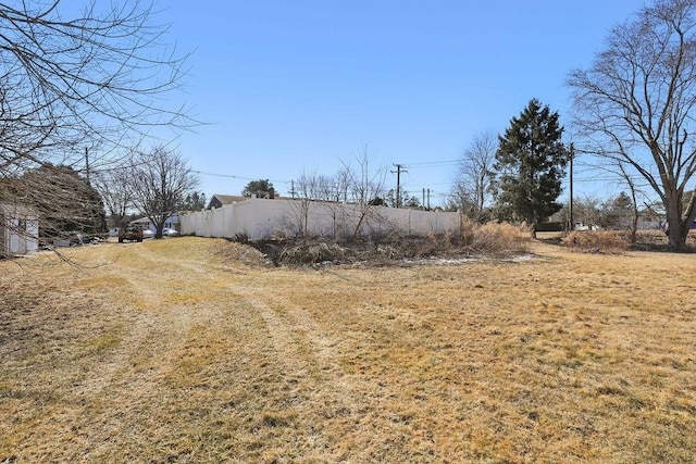 view of yard with fence