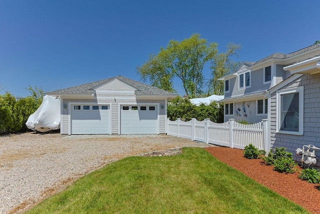 garage featuring driveway