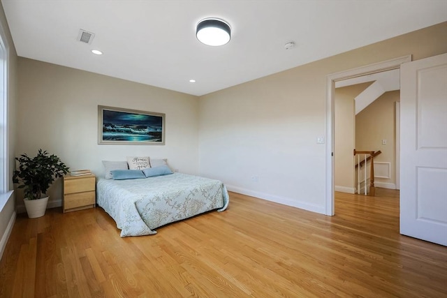 bedroom featuring light hardwood / wood-style floors