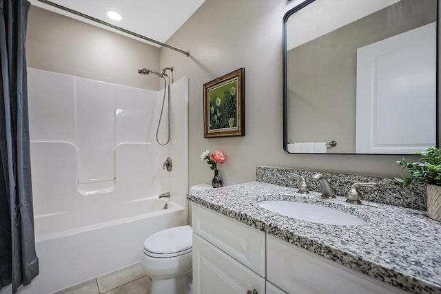 full bathroom with tile patterned flooring, shower / tub combo, vanity, and toilet