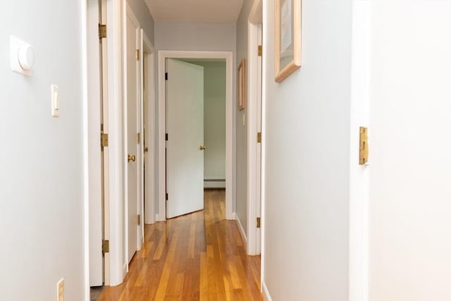 46 Plum St, Hamilton, MA 01982 - hallway featuring light wood-style floors and baseboard heating