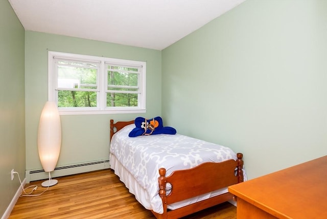 46 Plum St, Hamilton, MA 01982 - bedroom with baseboard heating and wood finished floors