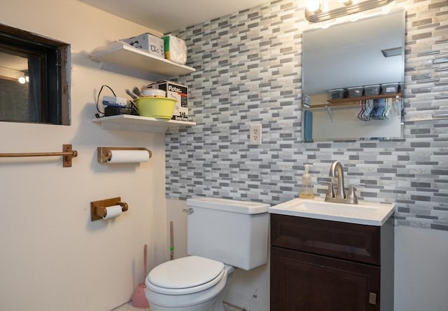 46 Plum St, Hamilton, MA 01982 - half bathroom featuring vanity, tile walls, and decorative backsplash