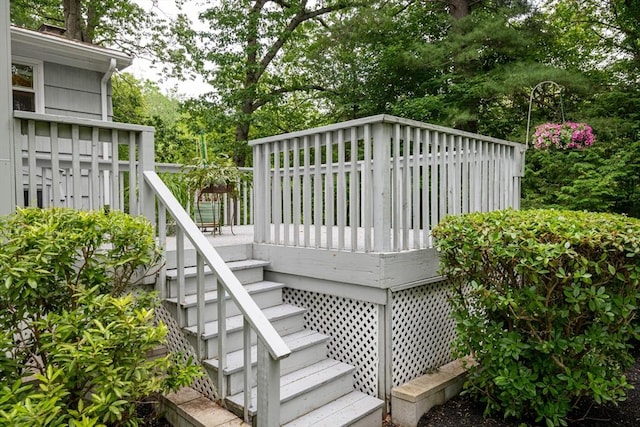 46 Plum St, Hamilton, MA 01982 - deck featuring stairway and view of scattered trees