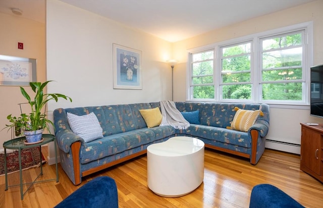 46 Plum St, Hamilton, MA 01982 - living room featuring a baseboard heating unit, plenty of natural light, and wood finished floors
