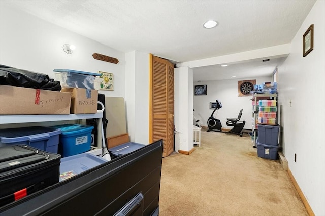57 Taft St, Medford, MA 02155 - bedroom with light carpet, a closet, baseboards, and recessed lighting