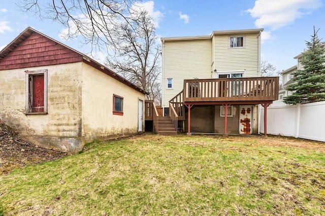 57 Taft St, Medford, MA 02155 - back of property with stairway and a wooden deck