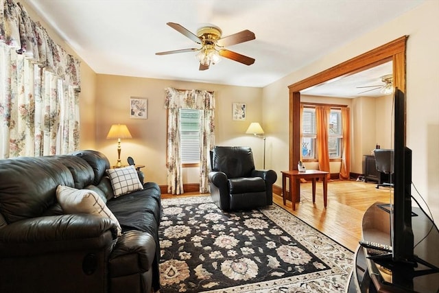 57 Taft St, Medford, MA 02155 - living area featuring ceiling fan, healthy amount of natural light, and baseboards