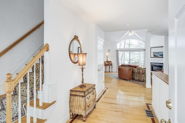 13 Laurel Hill Ct Unit 13, Bourne, MA 02532 - hallway featuring light wood-type flooring and stairway