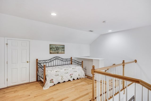 13 Laurel Hill Ct Unit 13, Bourne, MA 02532 - bedroom with wood finished floors, recessed lighting, and vaulted ceiling