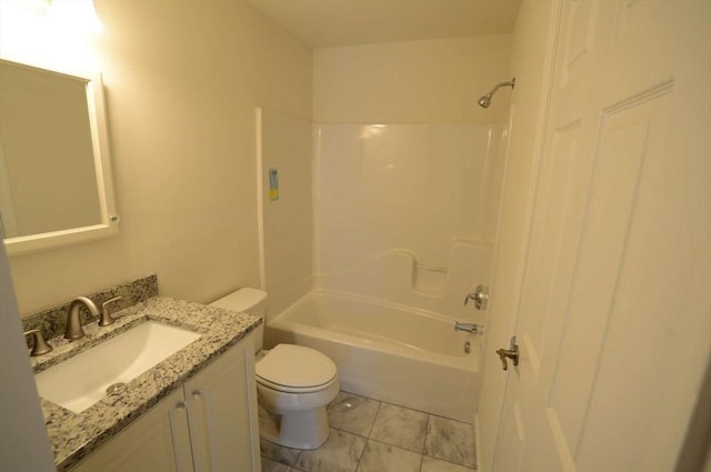 full bathroom with vanity, washtub / shower combination, and toilet