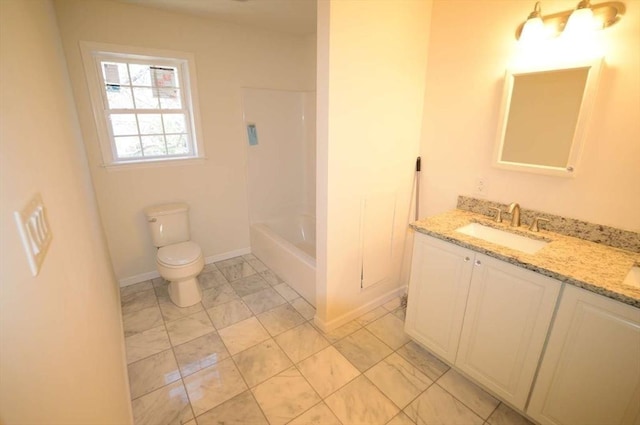 full bathroom with vanity, washtub / shower combination, and toilet