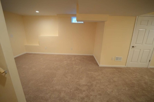 basement featuring carpet