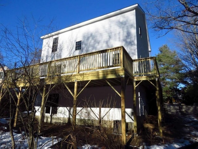 rear view of property with a deck