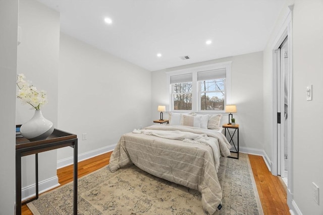 bedroom featuring hardwood / wood-style flooring