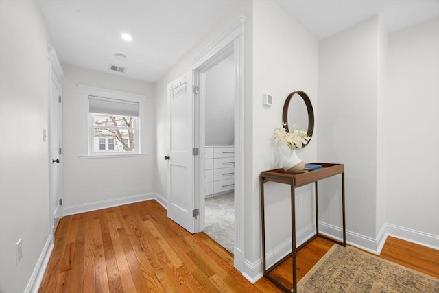 hallway featuring light hardwood / wood-style floors