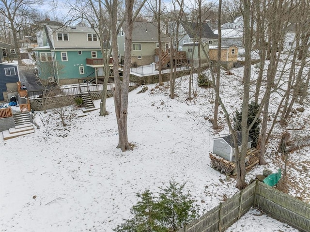 view of yard covered in snow