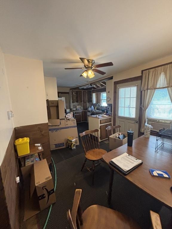 dining room featuring ceiling fan