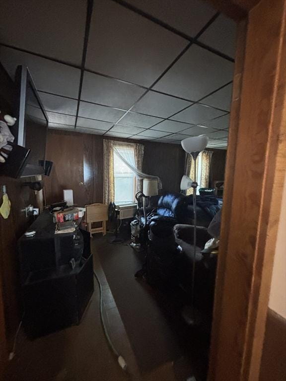 below grade area with a drop ceiling