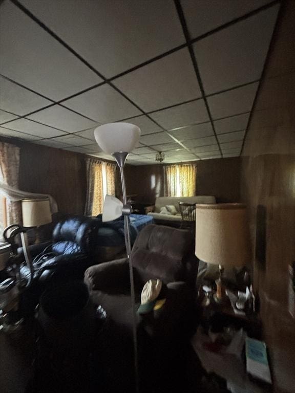 interior space featuring a paneled ceiling