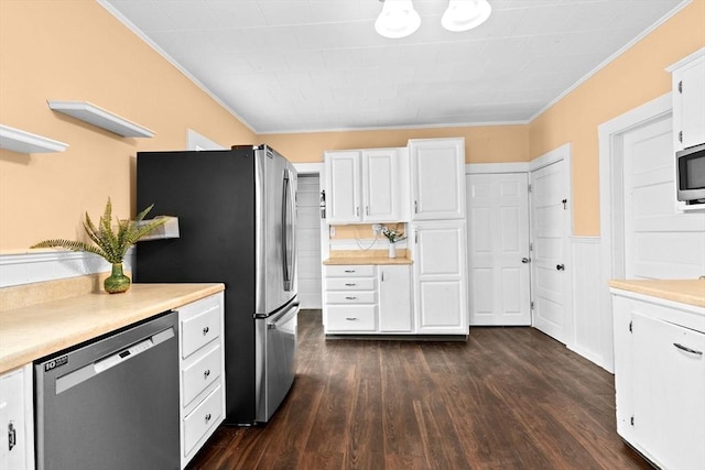 109 Bouve Ave, Brockton, MA 02301 - kitchen featuring appliances with stainless steel finishes, crown molding, white cabinetry, light countertops, and wainscoting