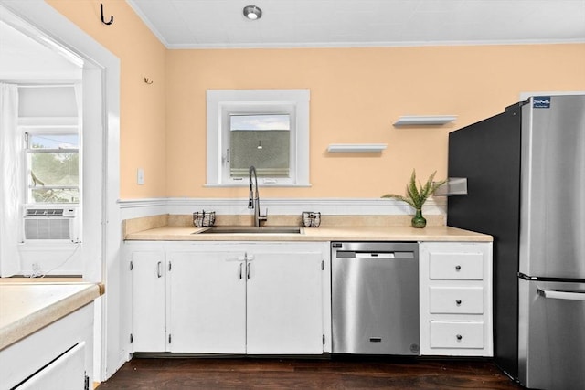 109 Bouve Ave, Brockton, MA 02301 - kitchen with appliances with stainless steel finishes, a sink, ornamental molding, cooling unit, and white cabinetry